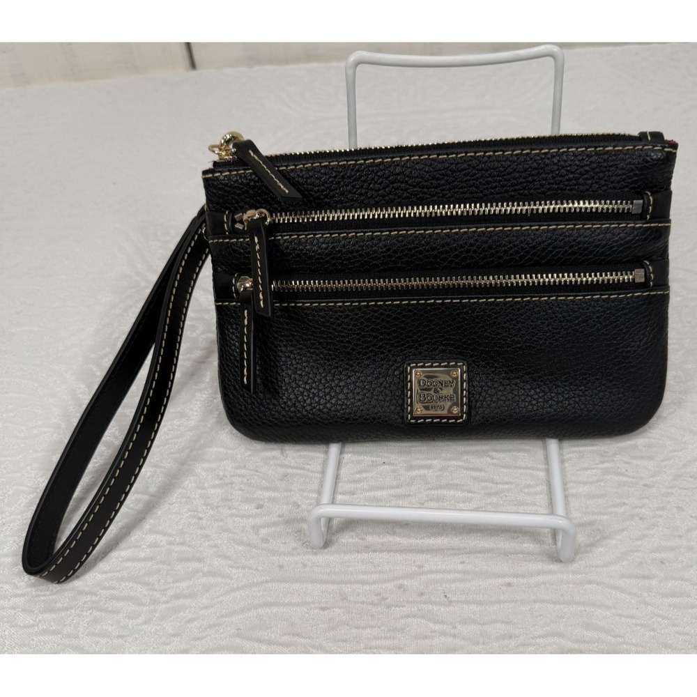 Black Dooney & Bourke pebble grain large triple wristlet zippered compartments